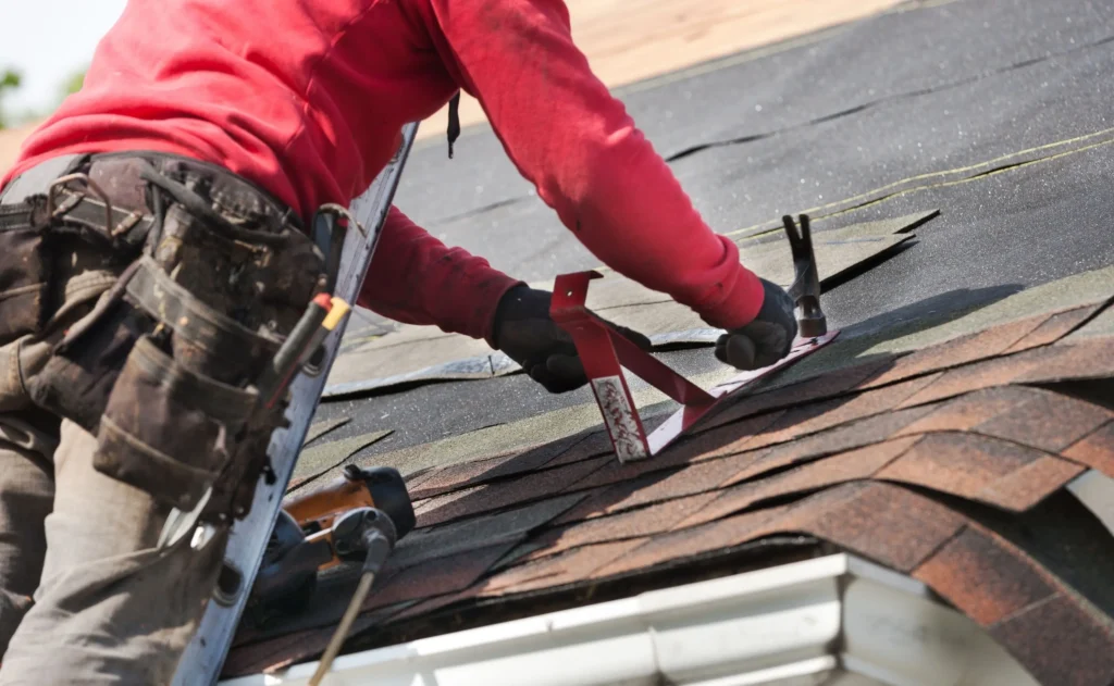 Contractor Installing Roof Shingles in Texas - TSG Roofing