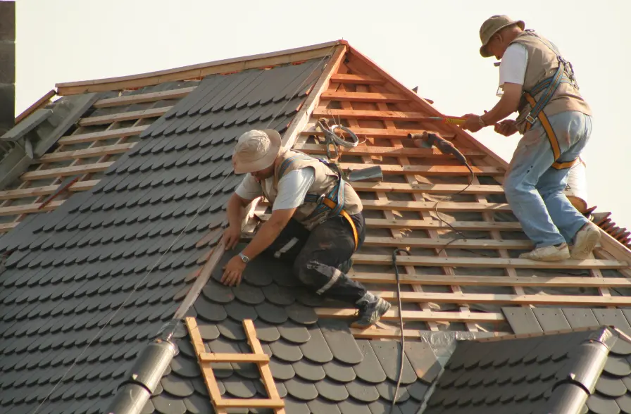 Two guys Replacing the Roof in Texas - TSG Roofing